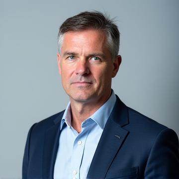 Professional headshot of Elias Kordell, Founder and CEO of Fyreglaide LLC